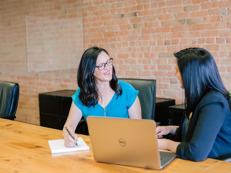 Two professionals in consultation — bookkeeping catch-up and cleanup